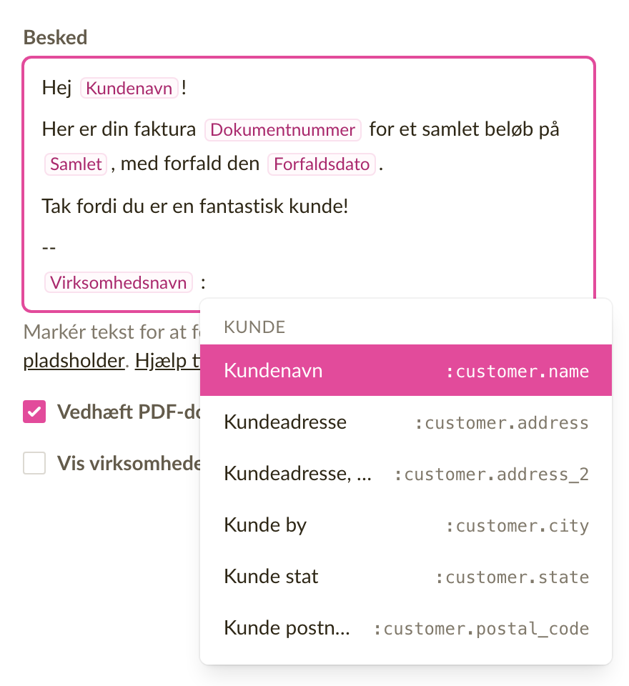 En e-mailskabelon med pladsholderbrikker i beskeden og pladsholderlisten åben